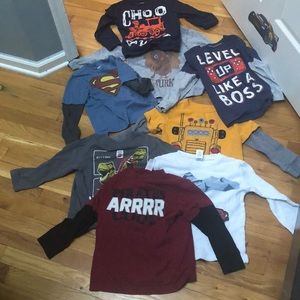 8 long sleeved shirts ranging from 4t-5t